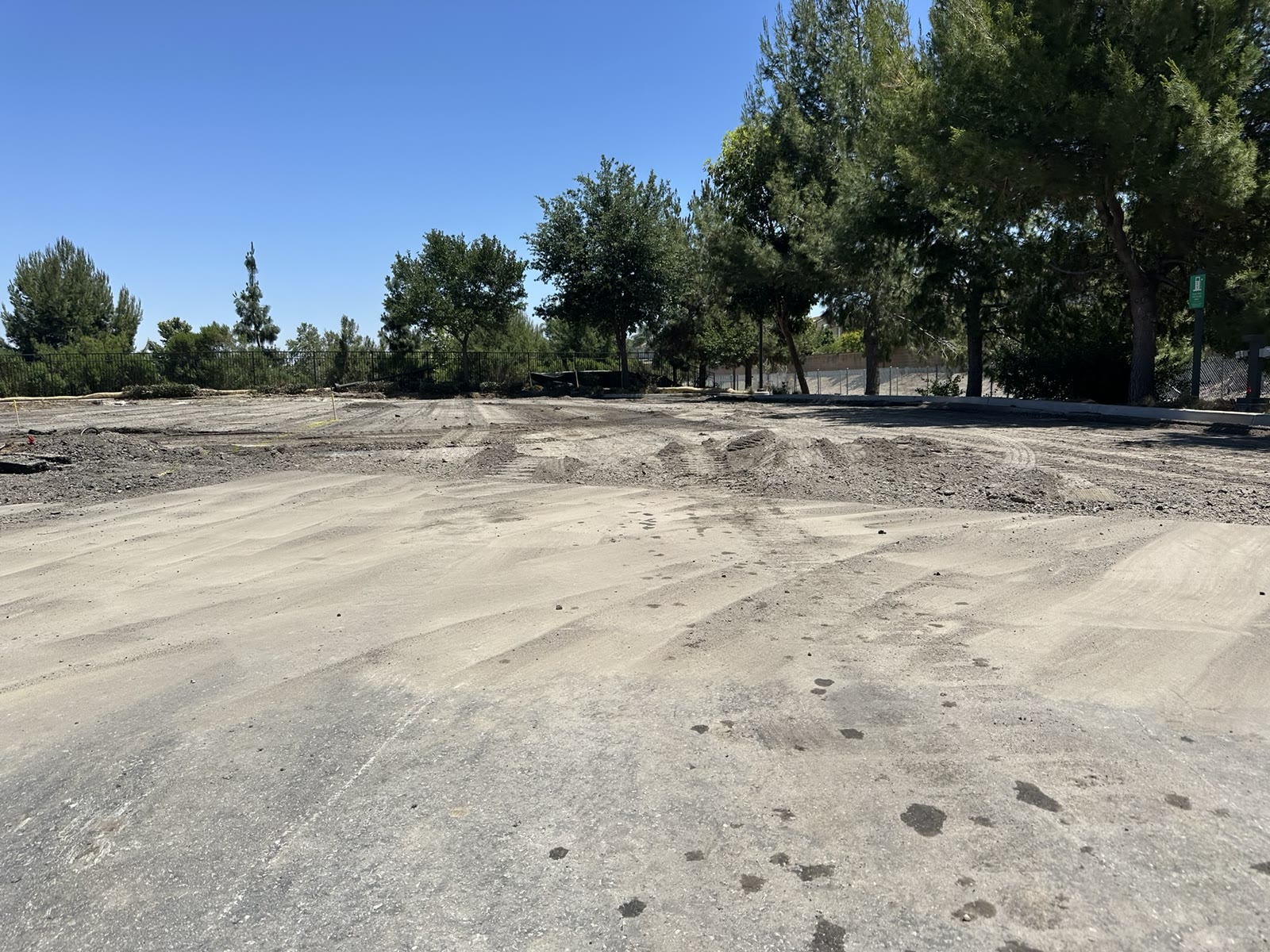 Site cleared and leveled after asphalt removal in Chino Hills, San Bernardino County